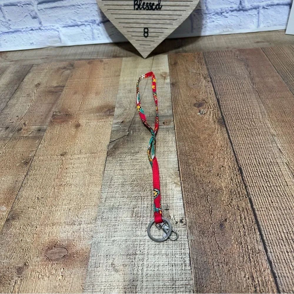 Colorful Vera Bradley lanyard 
Pre owned good condition. 
Multicolor red